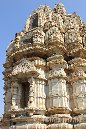 Daylight Shining On Ornate Stone Stupa