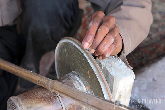 Artisan Grinding Mosaic Pieces