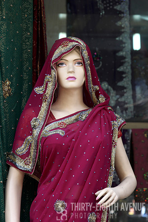 Western Mannequin Wearing Burgundy Sari